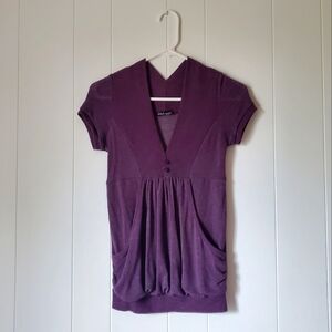 Wet Seal Eggplant Purple short-sleeved v neck top with pockets. Very flattering!